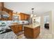 Kitchen featuring granite countertops, tile backsplash, stainless steel appliances, and a center island at 1155 Melrose Dr, Rock Hill, SC 29732
