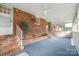 Enclosed sunroom with brick accents, multiple windows, and access to the outdoor at 1155 Melrose Dr, Rock Hill, SC 29732