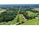 Aerial view of the expansive property, surrounded by lush greenery and featuring clearly defined lot lines at 117 Autumn Woods Dr, Kings Mountain, NC 28086