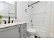 Modern bathroom featuring gray vanity with matte black fixtures and a shower-tub combination at 117 Autumn Woods Dr, Kings Mountain, NC 28086