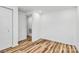 Bedroom featuring wood-look floors, and a closet with sliding doors at 117 Autumn Woods Dr, Kings Mountain, NC 28086