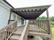 A large covered deck with steps leading down to the yard at 117 Autumn Woods Dr, Kings Mountain, NC 28086