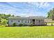 Charming single-story home featuring a covered front porch and well-maintained landscaping at 117 Autumn Woods Dr, Kings Mountain, NC 28086