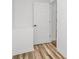 Hallway showcasing the flooring and a modern doorframe leading to other rooms at 117 Autumn Woods Dr, Kings Mountain, NC 28086