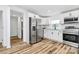 Well-lit kitchen featuring stainless steel appliances and updated cabinets and fixtures at 117 Autumn Woods Dr, Kings Mountain, NC 28086