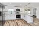 Modern kitchen featuring stainless appliances, white cabinets, a center island, and pendant lighting at 117 Autumn Woods Dr, Kings Mountain, NC 28086