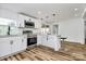 Modern kitchen with stainless steel appliances, white cabinets, and stylish flooring at 117 Autumn Woods Dr, Kings Mountain, NC 28086