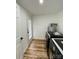 This well-lit laundry room includes modern machines, and a door to the outside at 117 Autumn Woods Dr, Kings Mountain, NC 28086
