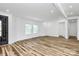 Bright living room featuring fresh white paint, wood floors, recessed lighting, and multiple windows at 117 Autumn Woods Dr, Kings Mountain, NC 28086