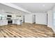 This bright open concept space features wood floors and a beautifully updated modern kitchen at 117 Autumn Woods Dr, Kings Mountain, NC 28086