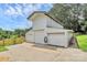 Outbuilding featuring three garage bays and concrete apron at 117 Autumn Woods Dr, Kings Mountain, NC 28086
