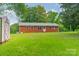 Well-maintained brick home with a spacious backyard, perfect for outdoor activities and enjoying nature at 1188 Rainbow Cir, Catawba, SC 29704