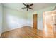 Empty bedroom featuring hardwood floors and a ceiling fan at 1188 Rainbow Cir, Catawba, SC 29704
