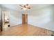 Empty bedroom showcasing hardwood floors, a ceiling fan, and a closet at 1188 Rainbow Cir, Catawba, SC 29704