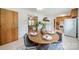 Eat-in dining room featuring a round table, four chairs and a view into the kitchen and living room at 1188 Rainbow Cir, Catawba, SC 29704