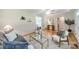 Comfortable living room with hardwood floors, ceiling fan, stylish furnishings, and neutral decor at 1188 Rainbow Cir, Catawba, SC 29704