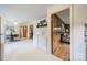 Open-concept area with laundry room, dining and living areas featuring modern design and decor at 1188 Rainbow Cir, Catawba, SC 29704