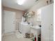 Functional laundry room equipped with a washer, dryer, sink, and ample storage at 119 Ashwood Ln, Mooresville, NC 28117