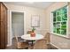 Bright breakfast nook with table, chairs, and a window offering outdoor views at 1230 Somersby Ln, Matthews, NC 28105