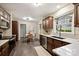 Kitchen with stainless steel appliances, solid surface countertops, and a breakfast nook at 1230 Somersby Ln, Matthews, NC 28105
