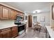 Kitchen featuring stainless steel appliances, granite countertops, and a breakfast nook at 1230 Somersby Ln, Matthews, NC 28105
