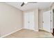 Bedroom features neutral paint, plush carpet and a ceiling fan at 13407 Morgan Lee Ave, Charlotte, NC 28213