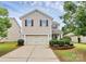 Charming two-story home featuring a two-car garage and well-maintained landscaping at 13407 Morgan Lee Ave, Charlotte, NC 28213