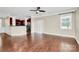 Bright living room featuring hardwood floors and sliding glass doors to the outside at 13407 Morgan Lee Ave, Charlotte, NC 28213