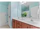 Bathroom features double vanity with light fixtures and mirrors at 13716 Glen Abbey Dr, Charlotte, NC 28278