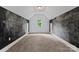 Bonus room features a chalkboard wall and carpet at 13716 Glen Abbey Dr, Charlotte, NC 28278