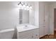 This bathroom features a combination tub and shower at 1401 Hillwood Ct, Charlotte, NC 28210