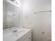 Bathroom featuring a bright mirror, sink, and towel racks at 1401 Hillwood Ct, Charlotte, NC 28210