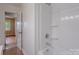 Bathroom featuring a tub and shower at 1401 Hillwood Ct, Charlotte, NC 28210