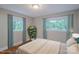Cozy bedroom with large windows offering scenic view at 1401 Hillwood Ct, Charlotte, NC 28210