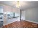 Inviting dining area with direct access to the kitchen, featuring hardwood flooring at 1401 Hillwood Ct, Charlotte, NC 28210