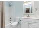 Bright bathroom with tub-shower, toilet, and vanity with nice fixtures at 14027 Hackamore Dr, Matthews, NC 28105