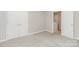 Bedroom featuring a closet, neutral carpet and a neutral paint scheme at 14027 Hackamore Dr, Matthews, NC 28105