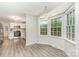 Bright dining area featuring a large bay window and access to the kitchen at 14027 Hackamore Dr, Matthews, NC 28105