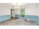 Inviting dining room featuring updated flooring and ample natural light at 14027 Hackamore Dr, Matthews, NC 28105