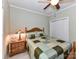 Cozy bedroom with a wooden bed frame, stylish lamps, and neutral wall colors at 147 Wren Hill Dr, Mooresville, NC 28115