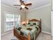 Bedroom with ceiling fan, a double bed and a large, sunlit window at 147 Wren Hill Dr, Mooresville, NC 28115