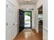 Entryway with hardwood floors and decorative moldings, leading to the rest of the house at 147 Wren Hill Dr, Mooresville, NC 28115