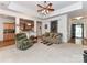 Spacious living room featuring tray ceilings and an open layout with kitchen access at 147 Wren Hill Dr, Mooresville, NC 28115