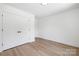 Clean bedroom featuring smooth flooring, and modern doors, offering a simple and functional space at 1490 White Hall Pl, Gastonia, NC 28056