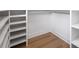Spacious walk-in closet featuring custom shelving, ample storage, and a clean, organized design at 1490 White Hall Pl, Gastonia, NC 28056