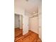 Bright bathroom featuring a shower/tub, linen closet and hardwood floors at 15025 Barbee Rd, Stanfield, NC 28163