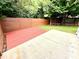 Spacious backyard with a combination of a concrete patio and wood deck at 1519 Briar Creek Rd # B, Charlotte, NC 28205