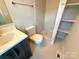 Well-lit bathroom with a modern vanity and a tiled walk-in shower at 1519 Briar Creek Rd # B, Charlotte, NC 28205