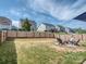Expansive backyard with a fire pit and seating, ideal for outdoor entertaining at 1607 Tundra Ln, Denver, NC 28037