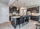 Stylish kitchen with a large island, stainless steel appliances, and sleek black cabinetry at 1607 Tundra Ln, Denver, NC 28037